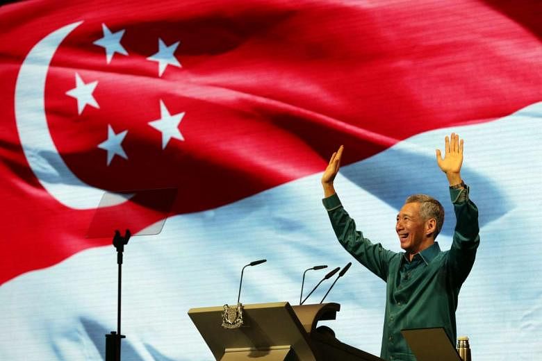 Prime Minister Lee Hsien Loong waving to the audience after his National Day Rally speech last year. The SG50 Rally tonight is an apt platform to reflect on Singapore's success and unite the nation for the road ahead. 