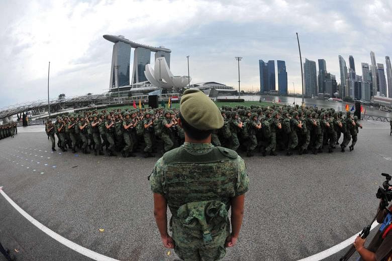 A passing-out parade at the Floating Platform in Marina Bay. Not only do two years of training as a soldier make a young man physically and mentally resilient (not to mention attractive), it is also a crucial rite of passage that marks the life of a Singa