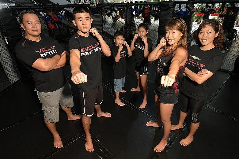 Parents Ken (left) and Jewelz (right) are okay with Angela's decision to put her studies on hold to pursue a career in MMA. Her brother Christian has also been endorsed by the Evolve MMA Fight Team while younger siblings Adrian and Victoria are also 