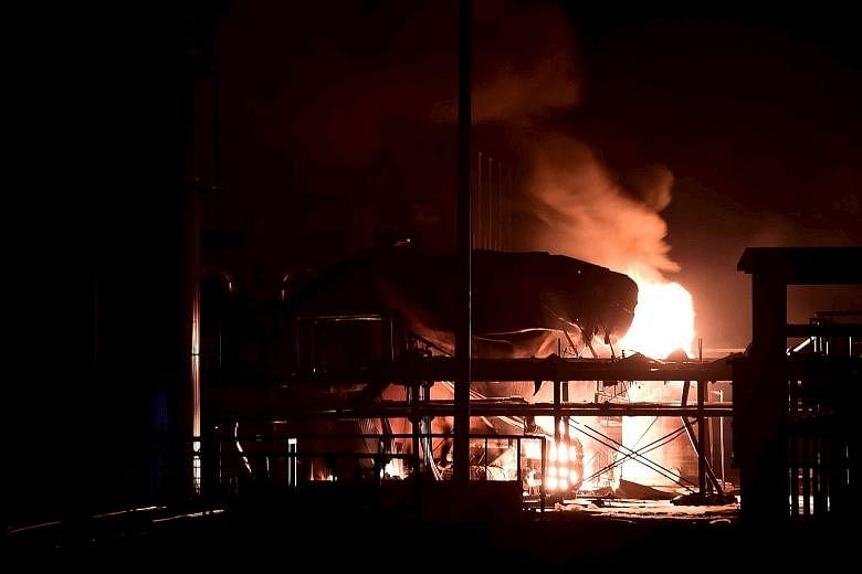 Smoke rising at the site of a blast in a factory in Huantai, a county in Zibo city, in China's Shandong province. The explosion, which occurred on Saturday night, ripped through a chemical plant, killing one person and injuring nine, China's official