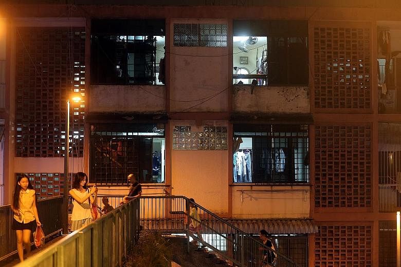 Checks by The Straits Times show foreign workers are continuing to live in homes in Geylang which have been illegally converted into dormitories. They often run fire safety risks.