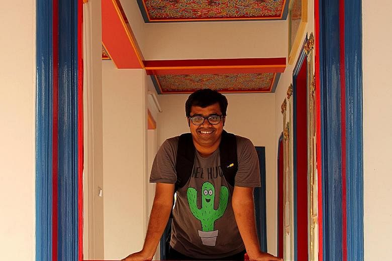 Indian artist KR Santhana Krishnan (above) focuses on doors in his works such as Open Doors - 18, 2015 (left).