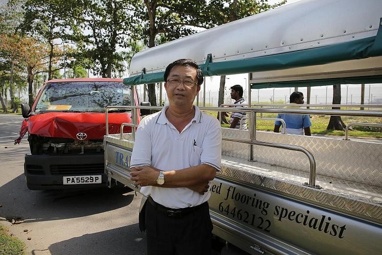 Mr Heng Ngee Seah's lorry was hit by a van trying to execute an illegal U-turn along Changi Coast Road last week. The Traffic Police recorded 129 traffic violations by heavy vehicles there last year.