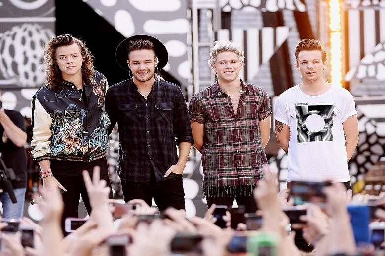 One Direction's (from far left) Harry Styles, Liam Payne, Niall Horan, and Louis Tomlinson performing in New York City recently.