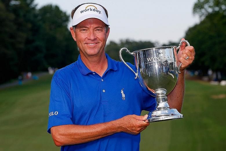 Davis Love with the Sam Snead Cup after winning the Wyndham Championship on Sunday, his first Tour victory since 2008.
