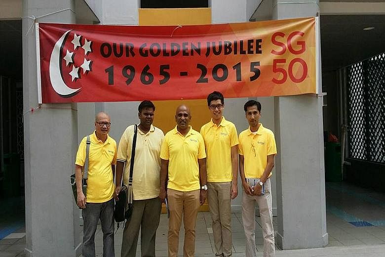 (From left) Mr Gilbert Ong, Mr Siva Chandran, Mr M. Ravi, Mr Roy Ngerng and Mr Osman Sulaiman wearing Reform Party T-shirts during their walkabout in Ang Mo Kio on Sunday. Mr Osman is likely to spearhead the party's Ang Mo Kio GRC team.