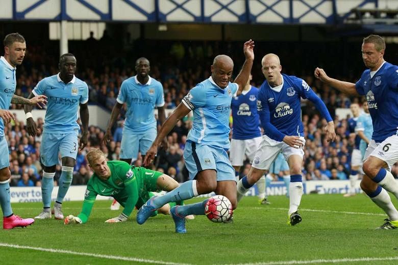 Vincent Kompany (centre) mopping up in his penalty box in Sunday's 2-0 win at Everton. The Manchester City captain said: "It is so important in any top team to have quality players all over." 