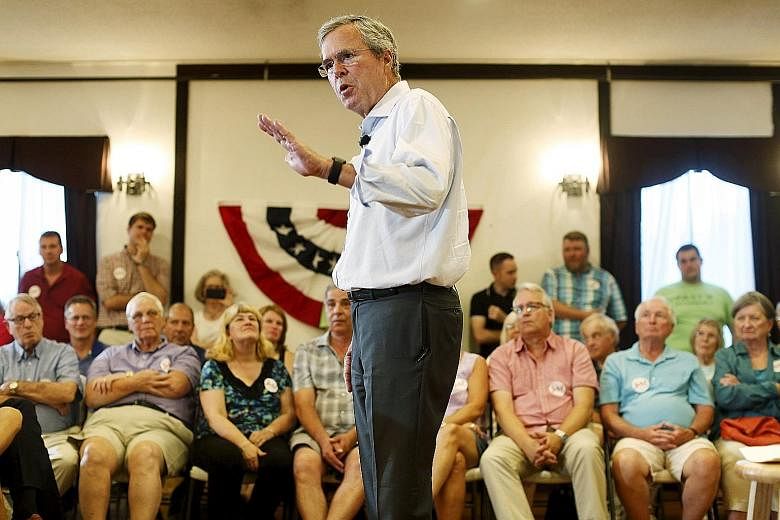 Presidential candidate Jeb Bush speaking at a town hall event in Merrimack, New Hampshire, last Wednesday. He has come under fire for using the term "anchor babies", a derogatory description of children born in the United States to undocumented paren