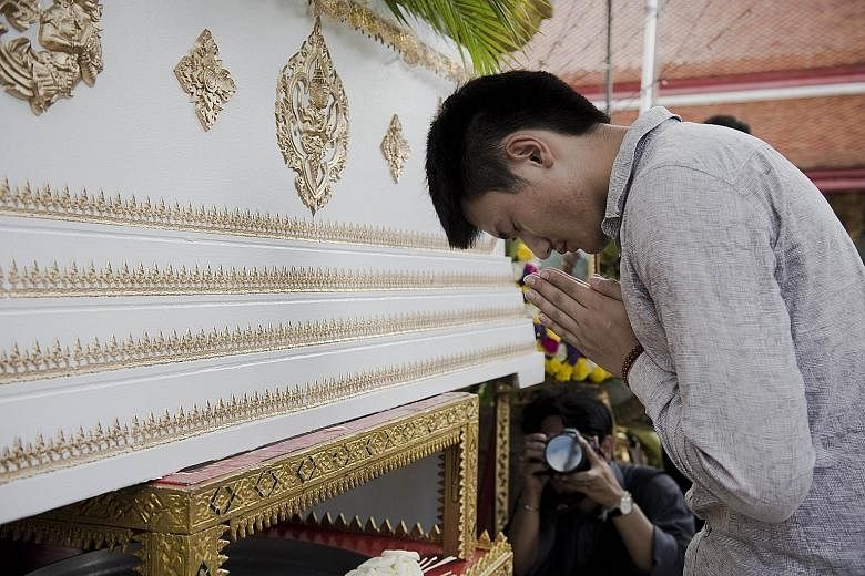 The funeral in Bangkok of Chinese tourist Gao Yu Zhu, who was killed with her mother in the Aug 17 bombing. Many of the 20 killed in the blast were foreigners.