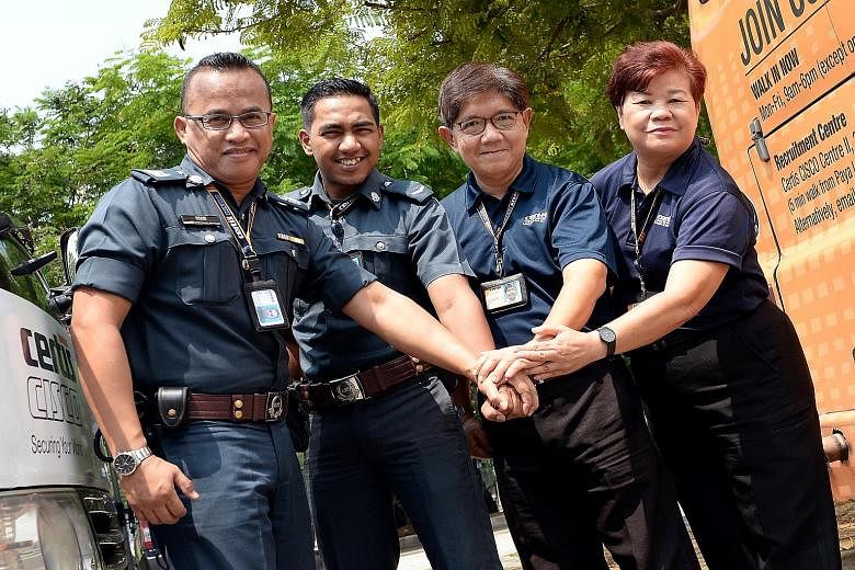 Among those who received the Team Commendation awards yesterday were (from left) Certis Cisco officers Yusaini Selamat, Simon Laurance, Tan Jea How and Irene Ho Yuet Pheng.