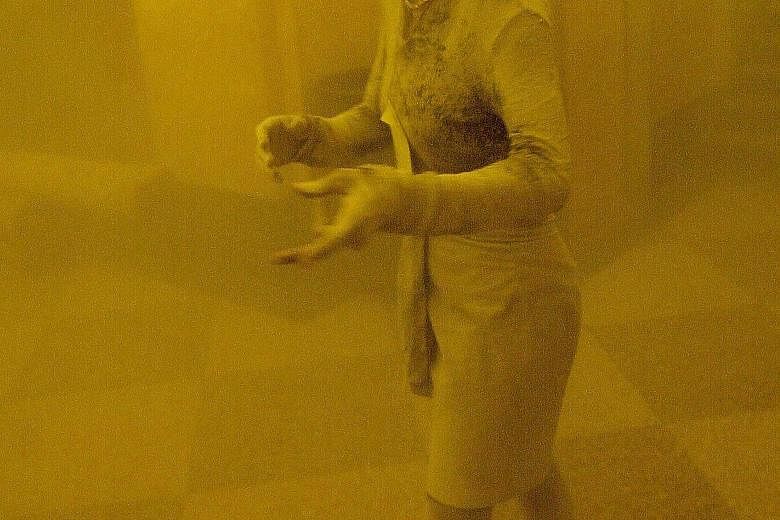 The Sept 11, 2001, photo of Ms Marcy Borders covered in dust as she takes refuge after escaping from the collapsing Twin Towers. Ms Borders felt her cancer could be a result of the attacks.