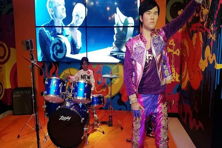 A wax figure of singer Jay Chou at Madame Tussauds Singapore, which is offering free admission to Singaporeans and permanent residents aged 50 years and older till Monday.
