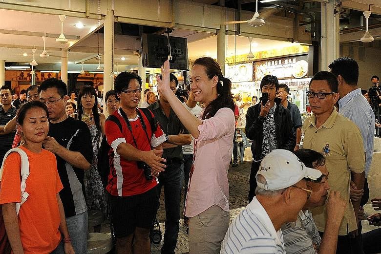 Ms Nicole Seah on the campaign trail in the 2011 election. She has told netizens that she would definitely return to Singapore from Bangkok to help out in the coming polls, but has ruled out being a candidate.