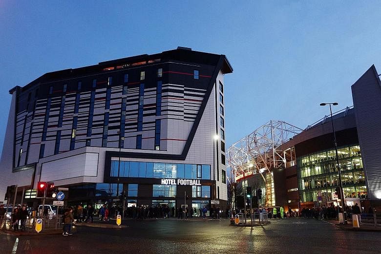 Rowsley chief executive Lock Wai Han (top) sees great market potential in Manchester, and Manchester United legend Gary Neville (above) expects the St Michael's project to be a landmark development for the city. Hotel Football is a Manchester United-