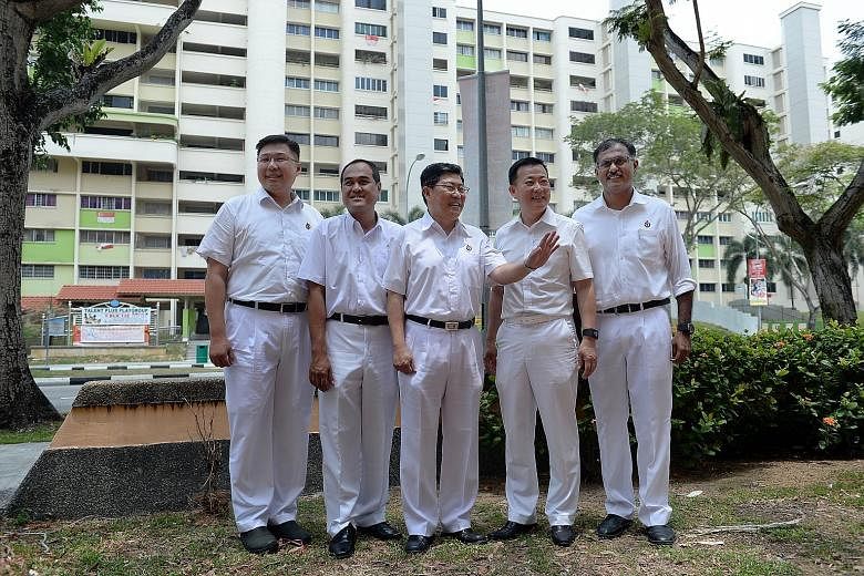 The PAP team for Aljunied GRC comprises (from left) private banker Chua Eng Leong, 44; former teacher Shamsul Kamar, 43; four-term veteran MP Yeo Guat Kwang, 54, who moves in from Ang Mo Kio GRC; insurance firm manager Victor Lye, 52; and lawyer K. M