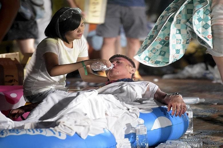 One of the hundreds of revellers who were injured at the water park on June 27. Eleven people were killed in the fire and, two months on, 42 victims are still in critical condition.