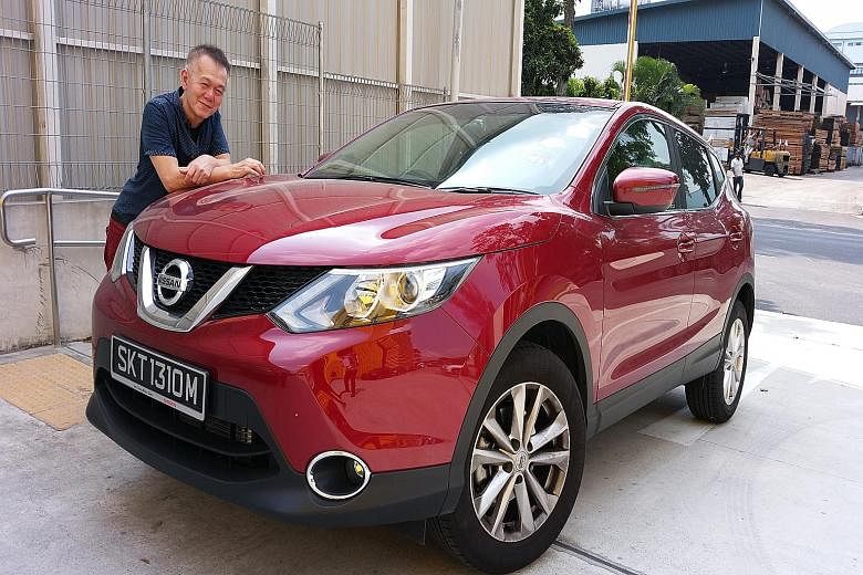 Mr Kelvin Tan (left, with wife June and son Bradley) bought a Range Rover Evoque and Mr Jonathan Lau (right) bought a Volvo XC60. Both did so partly for safety reasons. Mr Tan Teng Lip, who owns a BMW X6, likes SUVs for their toughness. Mr Simon Tong