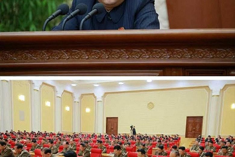 Undated pictures released by the Rodong Sinmun, the newspaper of the ruling North Korean Workers Party, yesterday show Mr Kim Jong Un (above) and a meeting of the Central Military Commission (right).
