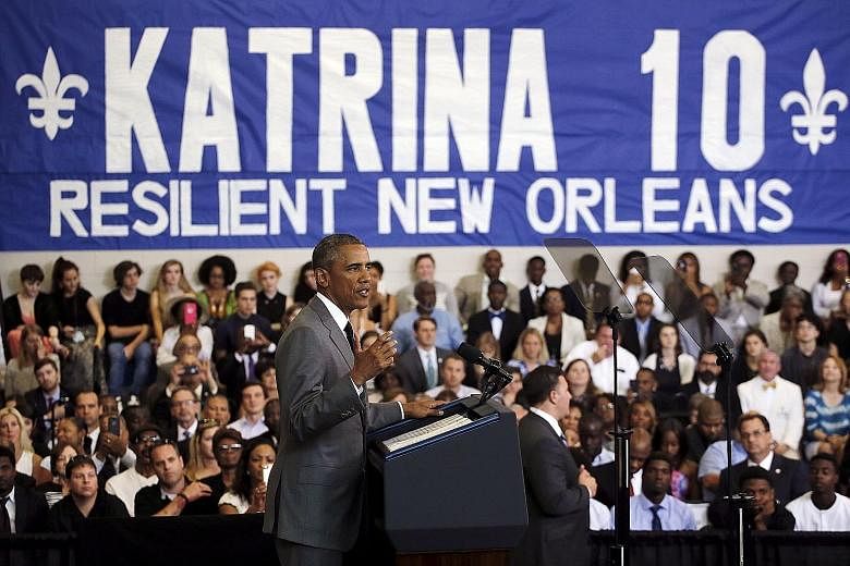 Mr Obama making a speech at a New Orleans community centre on Thursday. He said more needed to be done to overcome poverty.