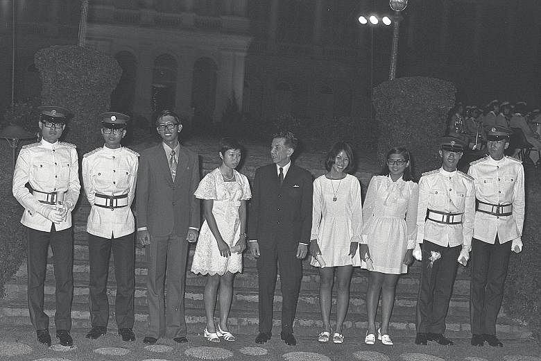 Eight of 11 President's Scholars from the class of 1972 are seen here with then President Benjamin Sheares (centre) at the Istana. They are (from left) Lim Hng Kiang, Lim Teik Hock, Chan Seng Onn, Lee Wei Ling, Lee Bee Wah, Yap Hui Kim, George Yeo an