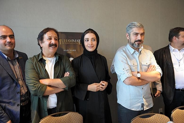 Director Majid Majidi (in white T and olive green shirt) with the crew of the Iranian movie Mohammad, Messenger Of God at its world premiere during the Montreal Film Festival last Thursday.
