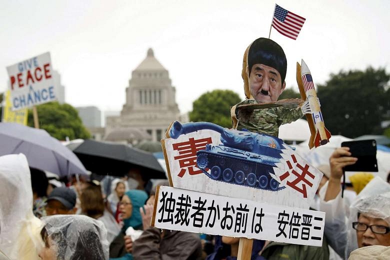 Tens Of Thousands Protest Against Military Bills Outside Japan's ...