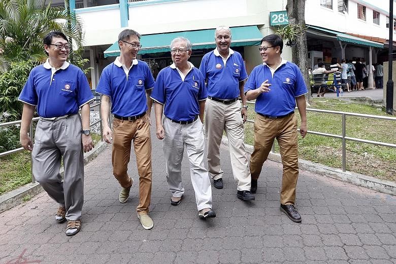 SingFirst candidates (from left) David Foo Ming Jin, Wong Chee Wai, Tan Peng Ann, Sukdeu Singh and Wong Soon Hong on a walkabout in Jurong GRC yesterday.