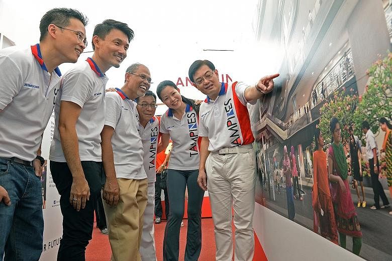 (From left) Mr Desmond Choo, Mr Baey Yam Keng, Minister in the Prime Minister's Office and Tampines grassroots adviser Masagos Zulkifli, Mr Mah Bow Tan, Ms Cheng Li Hui and Education Minister Heng Swee Keat at the Our Tampines Hub exhibition yesterda