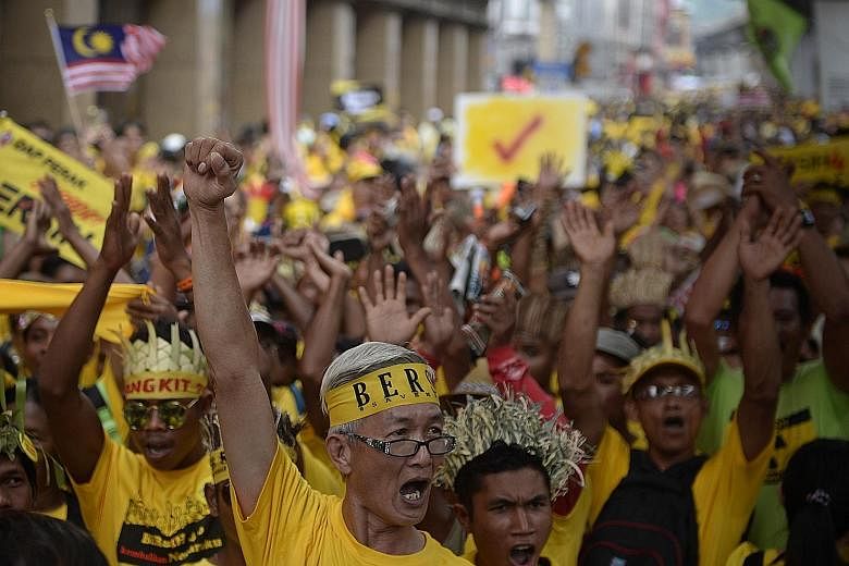 (Clockwise, from above) Protesters from the Orang Asli community marching at the Bersih 4.0 rally yesterday; participants sleeping on the street overnight in Kuala Lumpur; and former prime minister Mahathir Mohamad making an appearance at the rally n