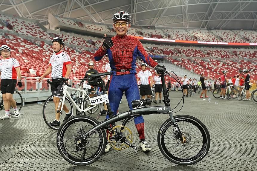 While quite a few participants at yesterday's OCBC Cycle boasted fancy bikes, Mr Stanley Neo, aka 'Spider-Man', stood out by riding in a fancy costume in The Straits Times Ride (23km). The 51-year-old was among more than 7,300 cyclists who took part 