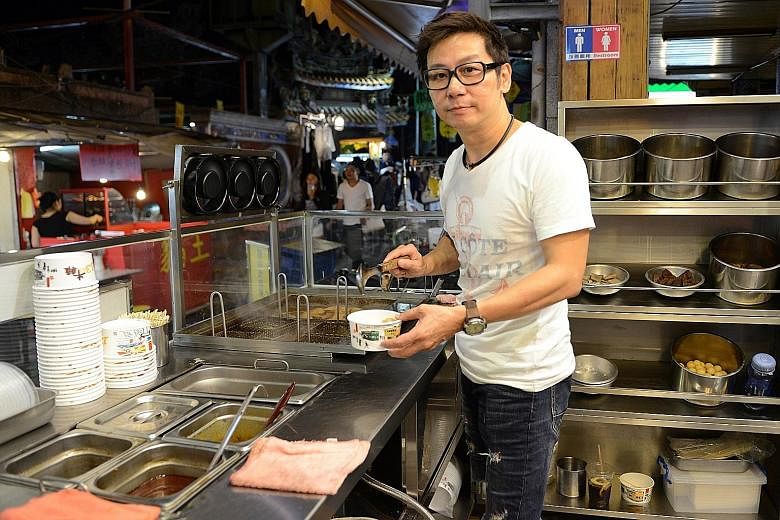 Vendor Ah Tong, seen here at his eatery in Shilin, moved his business from Hong Kong to Taiwan last year, when a record 7,498 people from Hong Kong and nearby Macau obtained residency in Taiwan - with the bulk of them from Hong Kong.