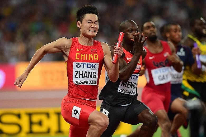 Zhang Peimeng runs the anchor leg of the 4x100m relay at the IAAF World Championships in Beijing on Aug 29. China were third, behind Jamaica and the United States but were elevated to second after the US were disqualified. The sprint quartet also won