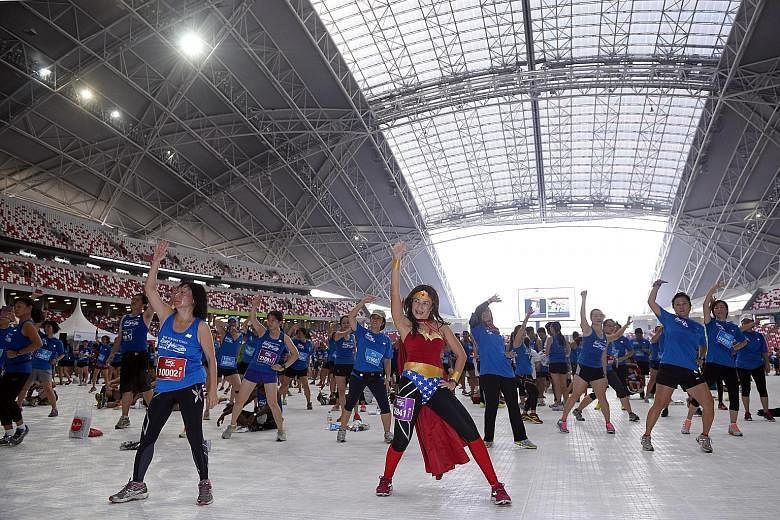 Last year, participants in The Straits Times Run at the Hub took the opportunity to burn more calories with a zumba workout.