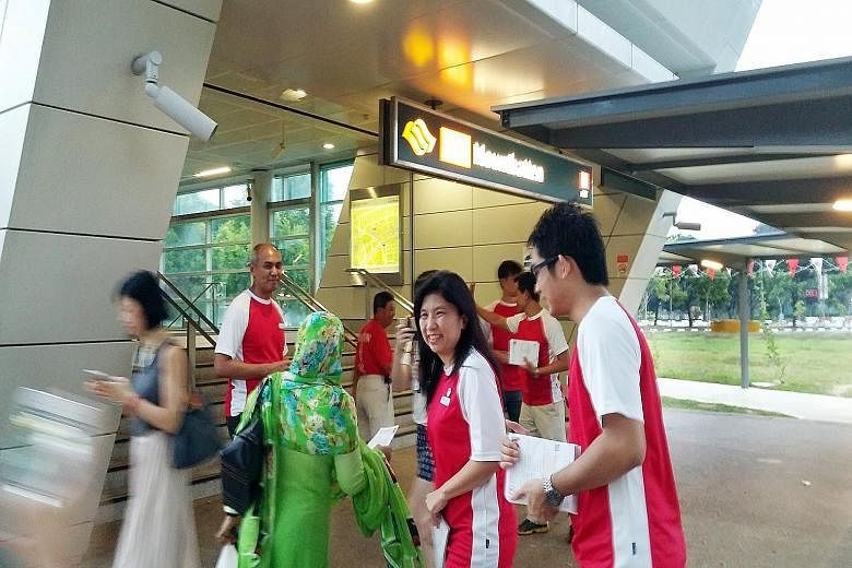 Left: PAP candidate Lim Biow Chuan meeting residents in Jalan Batu. Right: SPP candidate Jeannette Chong-Aruldoss handing out fliers outside Mountbatten MRT station with campaign volunteers. Both candidates have been working hard in the constituency 