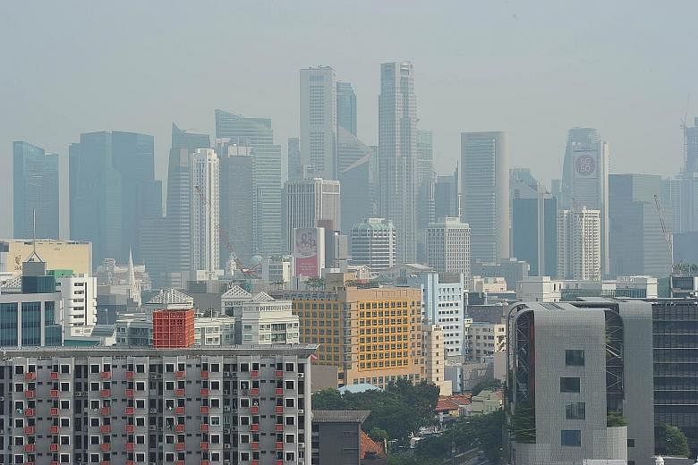 The city skyline at 4.30pm yesterday. The three-hour PSI at 4pm was 94, according to the NEA website. Air quality is considered unhealthy if the index crosses 100. Given the haze forecast, the NEA advised people to reduce outdoor activities and physi