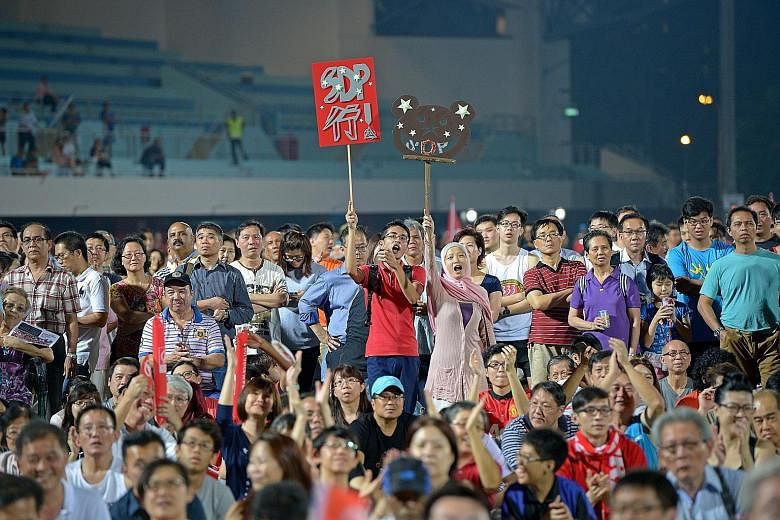 The crowd at the SDP rally at Choa Chu Kang stadium last night. Eight SDP members took turns to speak on healthcare, housing, competition from foreign talent and retirement.