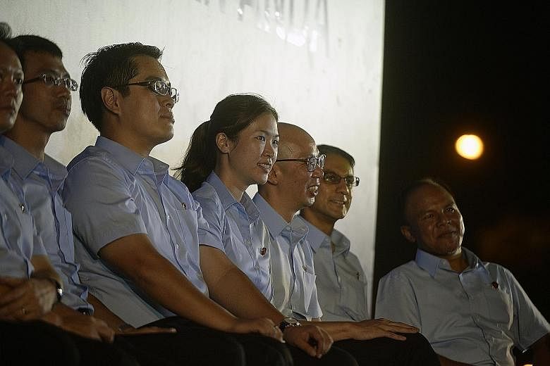 WP candidates (from far left), Dylan Ng, Bernard Chen, Ron Tan, He Ting Ru, Terence Tan and Leon Perera at the WP rally in Boon Keng Road. Ms He described how she overcame initial fears to join an opposition party.