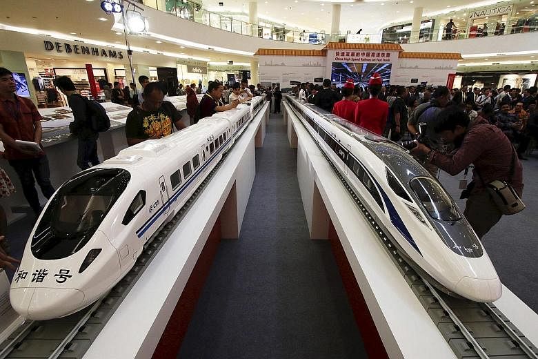 Models of high speed trains were displayed at the China High Speed Railway on Fast Track exhibition in Jakarta last month. China and Japan were both bidding for the high-speed rail project that was scrapped by Indonesia.