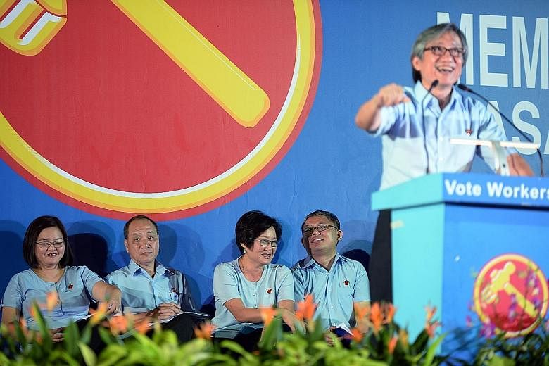 The Workers' Party's Mr Chen Show Mao speaking at the party's rally for Punggol East last night. With him were (from left) the WP's Punggol East SMC candidate Lee Li Lian, party chief Low Thia Khiang, chairman Sylvia Lim and Mr Koh Choong Yong, who i