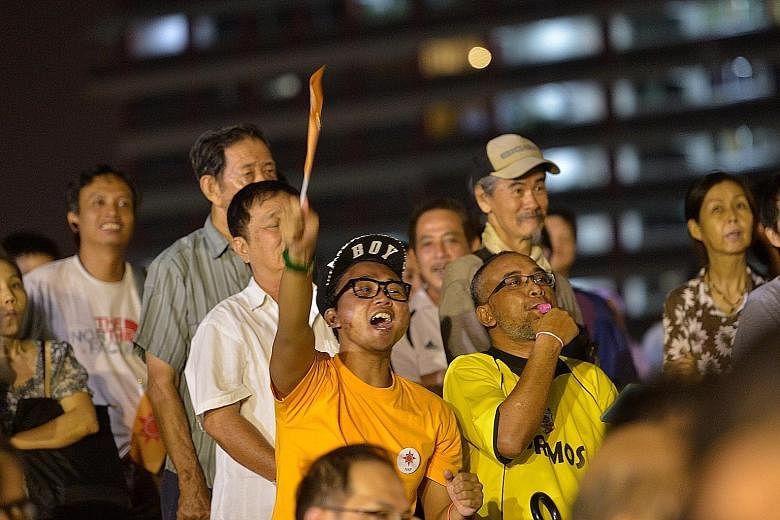 Spectators at the National Solidarity Party rally in Tampines last Saturday. The writer met various folks there, from rally-hoppers to dyed-in-the-wool opposition supporters.