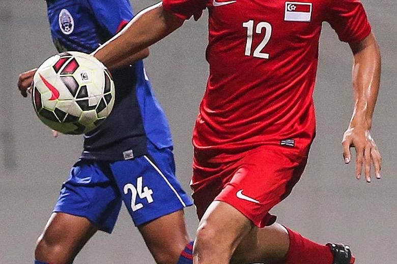 Irfan Jeferee (No. 12) scored Singapore's third goal in the 87th minute to seal the 3-1 win after Cambodia scored the opening goal.
