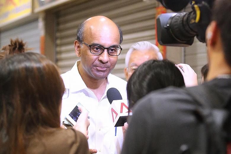 Singapore's success in an increasingly volatile and fragile world underlines the confidence of investors and businesses in the country, says Mr Tharman, who was at Taman Jurong Market yesterday.