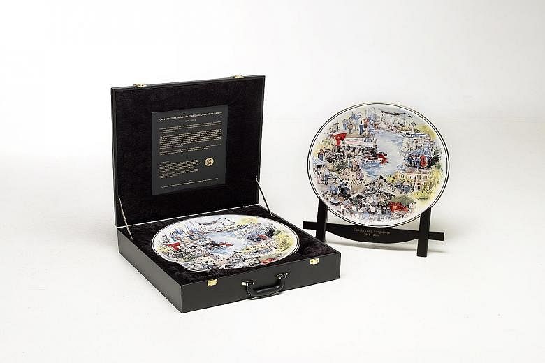 The plate, with artwork by watercolour artist Ng Woon Lam, features familiar Singapore buildings such as Raffles Hotel and Esplanade - Theatres on the Bay.