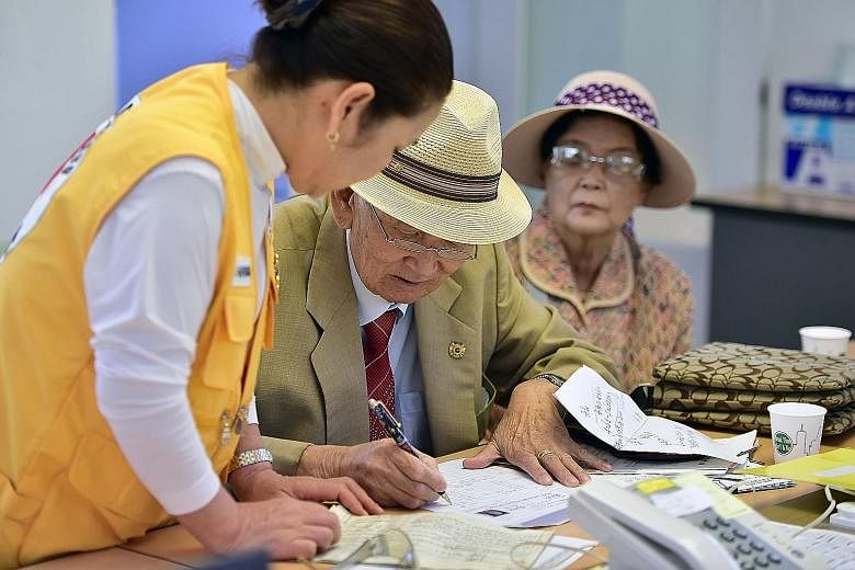 An elderly man at the Red Cross office in Seoul applying to be chosen for the next Korean family reunion.