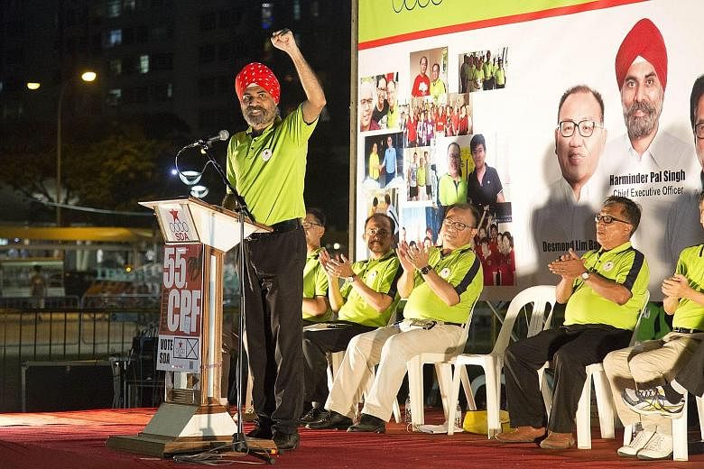 Mr Harminder Pal Singh of the Singapore Democratic Alliance gesturing to the crowd at his party's Pasir-Punggol GRC rally yesterday. People attending yesterday's People's Power Party rally in Chua Chu Kang GRC. The PPP is fielding four candidates - M