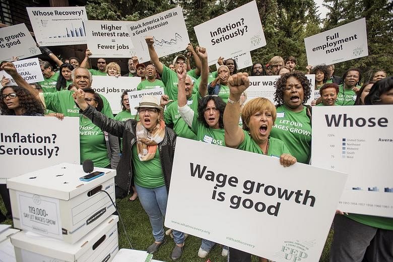 "Fed Up" movement members protesting at the Jackson Hole symposium in Wyoming last month, to let the policymakers know their decisions affect ordinary people, not just financiers. Since the start of the US economic "recovery", as declared by Fed offi
