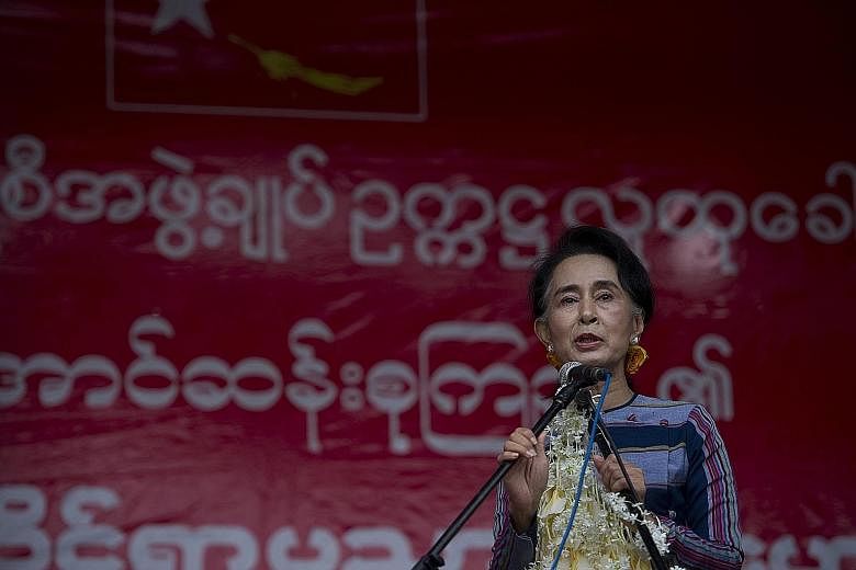 NLD chief Aung San Suu Kyi speaking during a voter education campaign in Myanmar's Shan state on Sunday. Her party is expected to win big in the Nov 8 polls, the country's first free general election since the end of military rule.