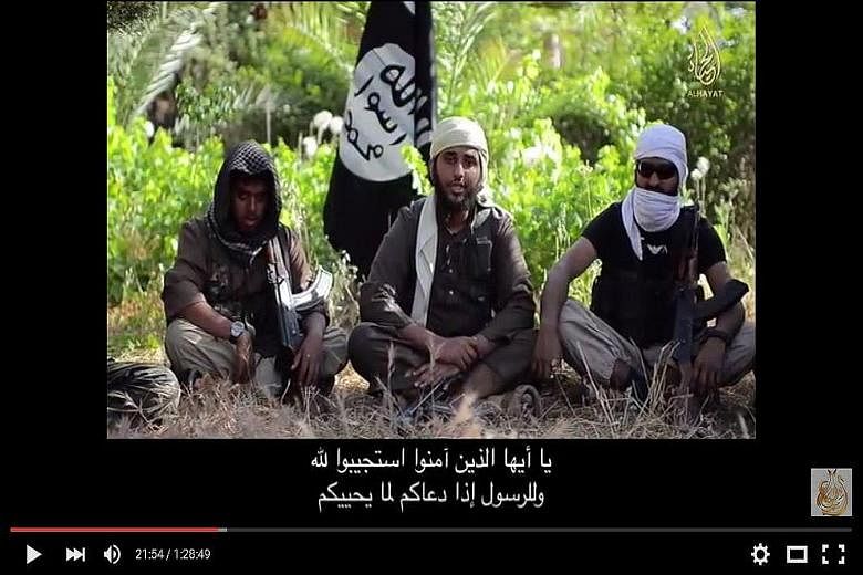 British ISIS militants Reyaad Khan (left) and Ruhul Amin (right) pictured here in a screengrab from an ISIS propaganda video. They were both killed in Britain's first air strike against Syria last month, British Prime Minister David Cameron announced