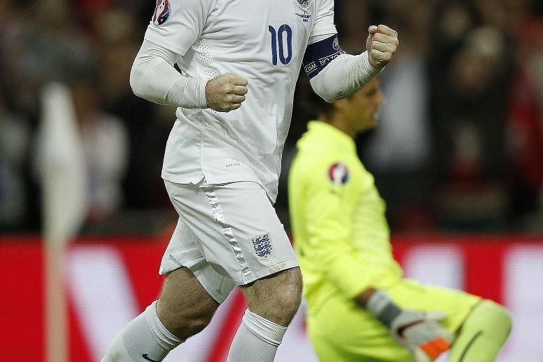 England captain Wayne Rooney after scoring a penalty against Switzerland in Tuesday's 2-0 win in a Euro 2016 qualifier at Wembley. Rooney's goal broke Bobby Charlton's England record that had stood for 45 years.
