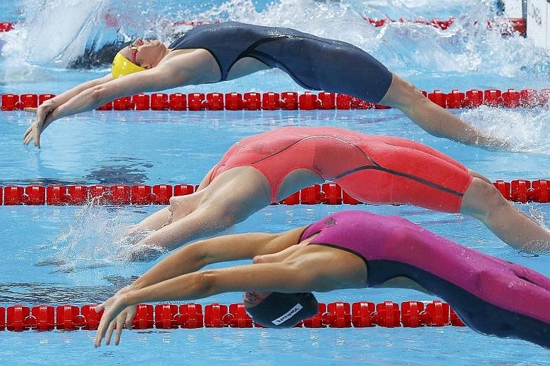 From top: Australia's Emily Seebohm got the better of Missy Franklin of the US in the 200m backstroke at the World Championships in Kazan last month.